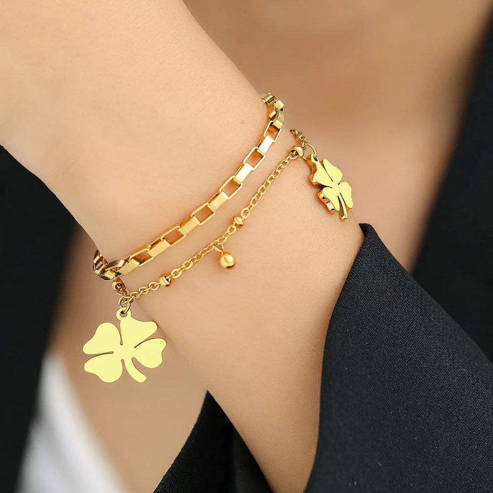 Elegant Bell Clover Pendant Bracelet – Stainless Steel & Bead Detailing