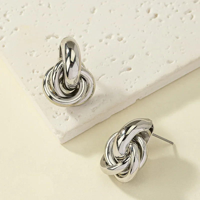 Fashionable Gold and Silver Knot Earrings – Shiny Plated Studs for Women