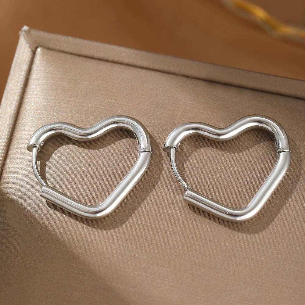 Exquisite Heart Hollow Stud Earrings – Elegant Stainless Steel Jewelry for Women