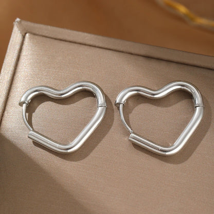 Exquisite Heart Hollow Stud Earrings – Elegant Stainless Steel Jewelry for Women