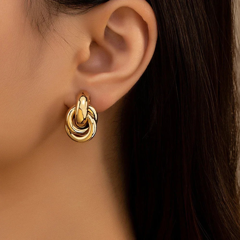 Fashionable Gold and Silver Knot Earrings – Shiny Plated Studs for Women