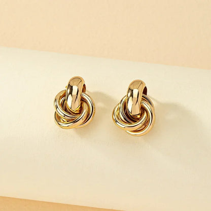 Fashionable Gold and Silver Knot Earrings – Shiny Plated Studs for Women