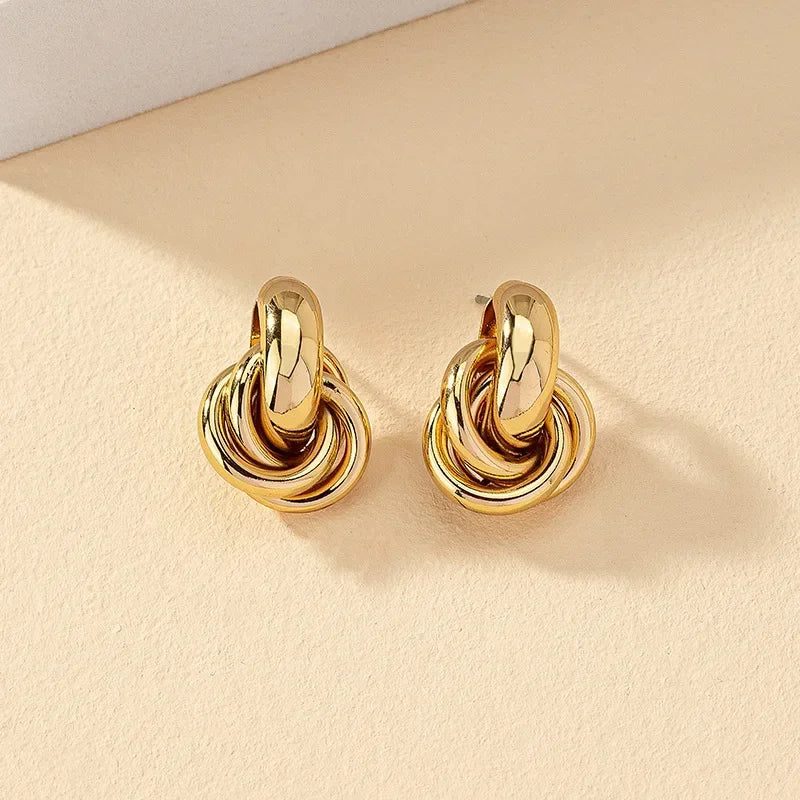 Fashionable Gold and Silver Knot Earrings – Shiny Plated Studs for Women