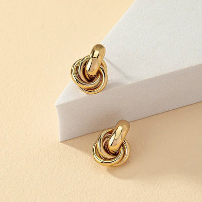 Fashionable Gold and Silver Knot Earrings – Shiny Plated Studs for Women